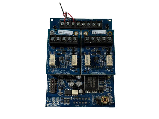 IDNet 2+2 fire alarm control panel circuit board with loop expansion cards and wiring terminals