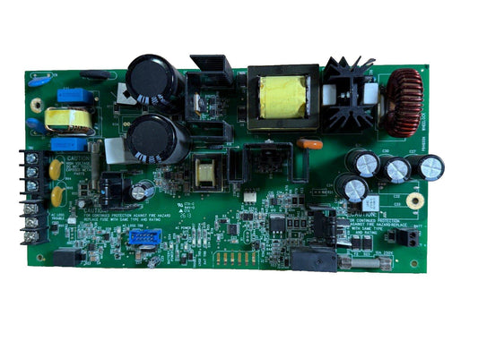 Fire alarm control panel circuit board with capacitors, transformer, and safety warnings for fire hazard protection