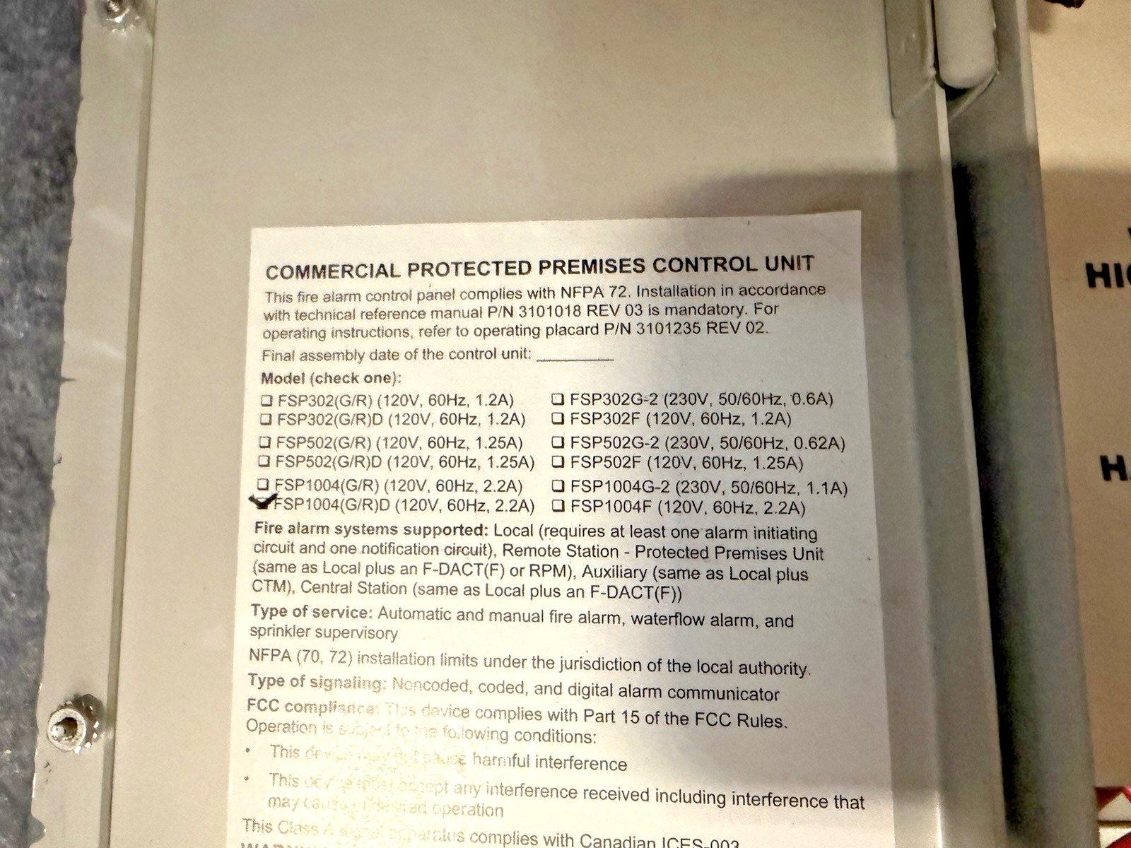 FSP1004G/R/D fire alarm control panel label, NFPA 72 compliant, commercial protected premises unit