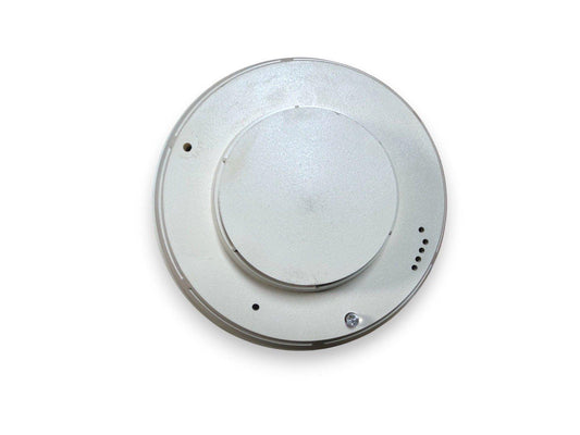 White circular fire alarm base with mounting holes and screw, for smoke detector installation