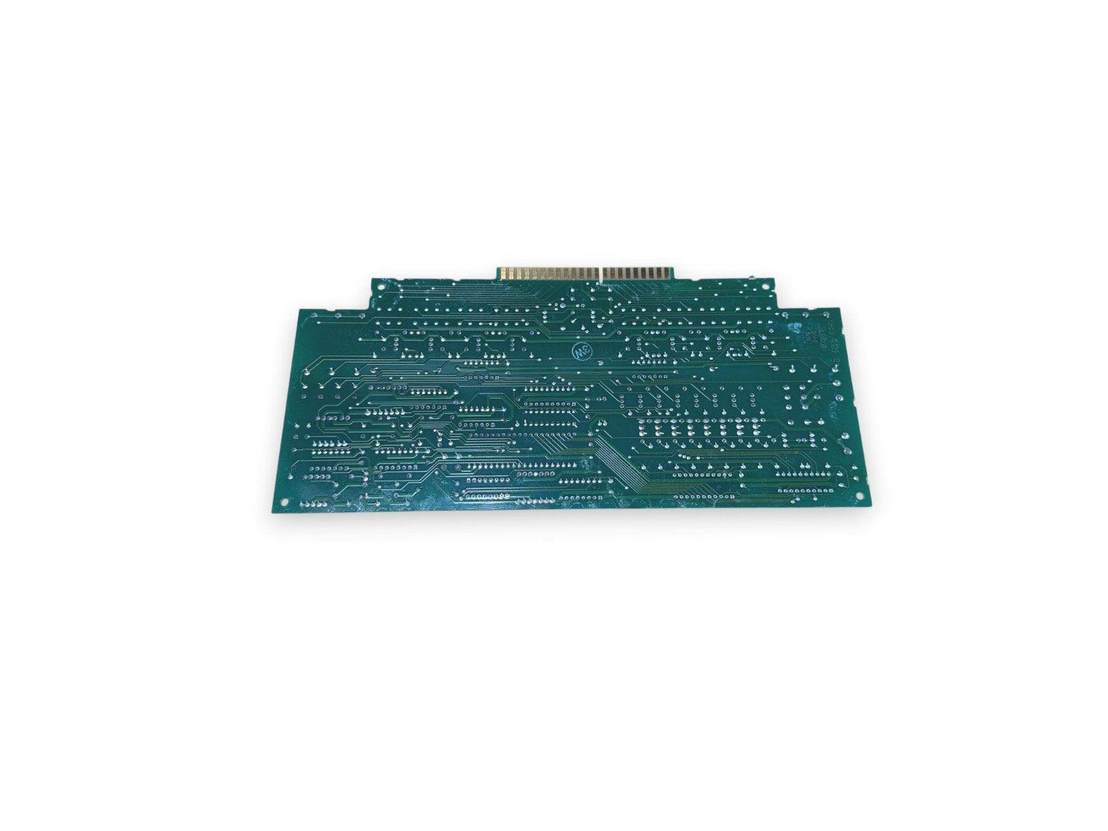 Green fire alarm control panel circuit board with gold connector pins
