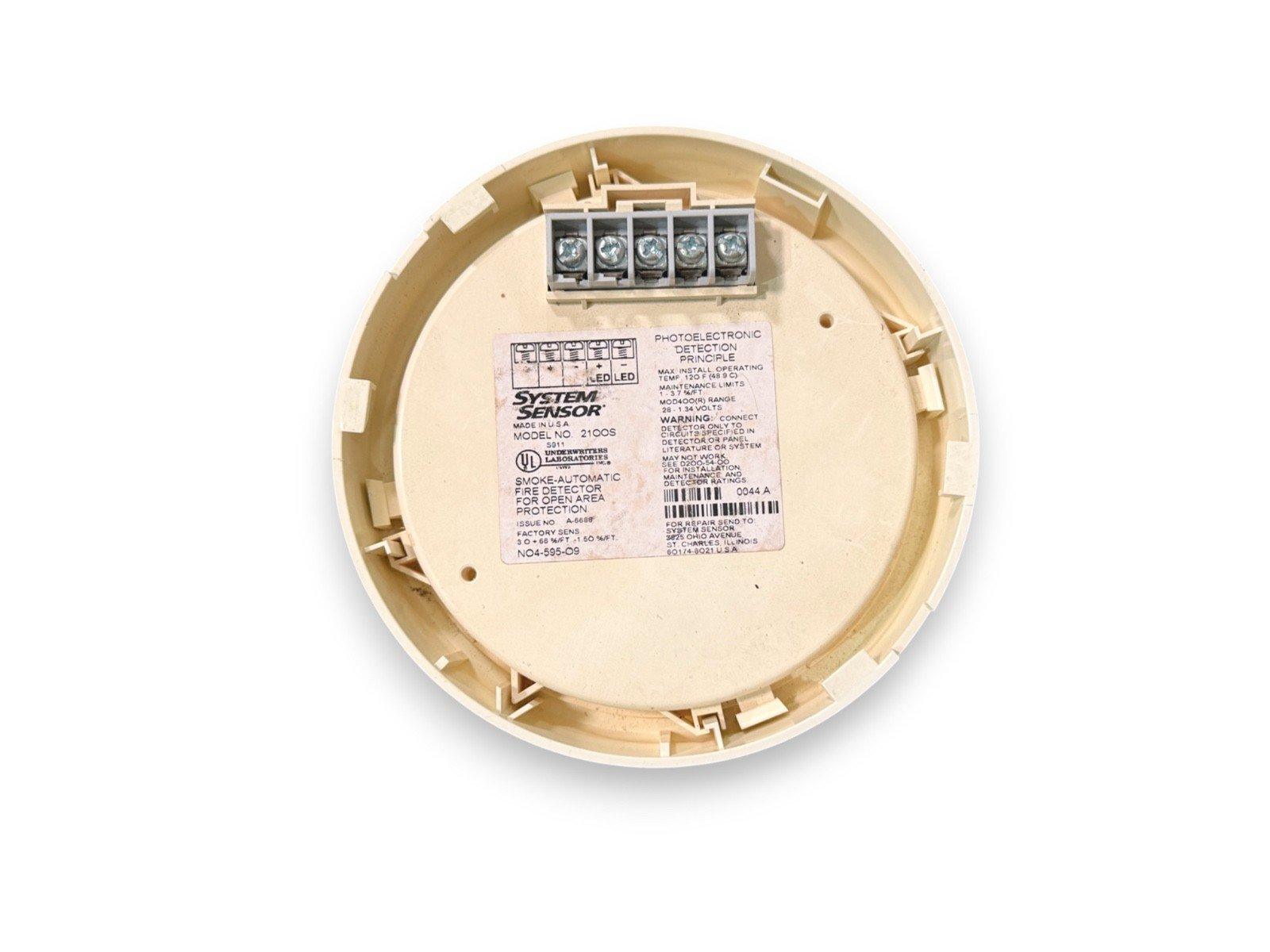 System Sensor 2100S smoke detector back view with wiring terminals and specs label for fire alarm systems