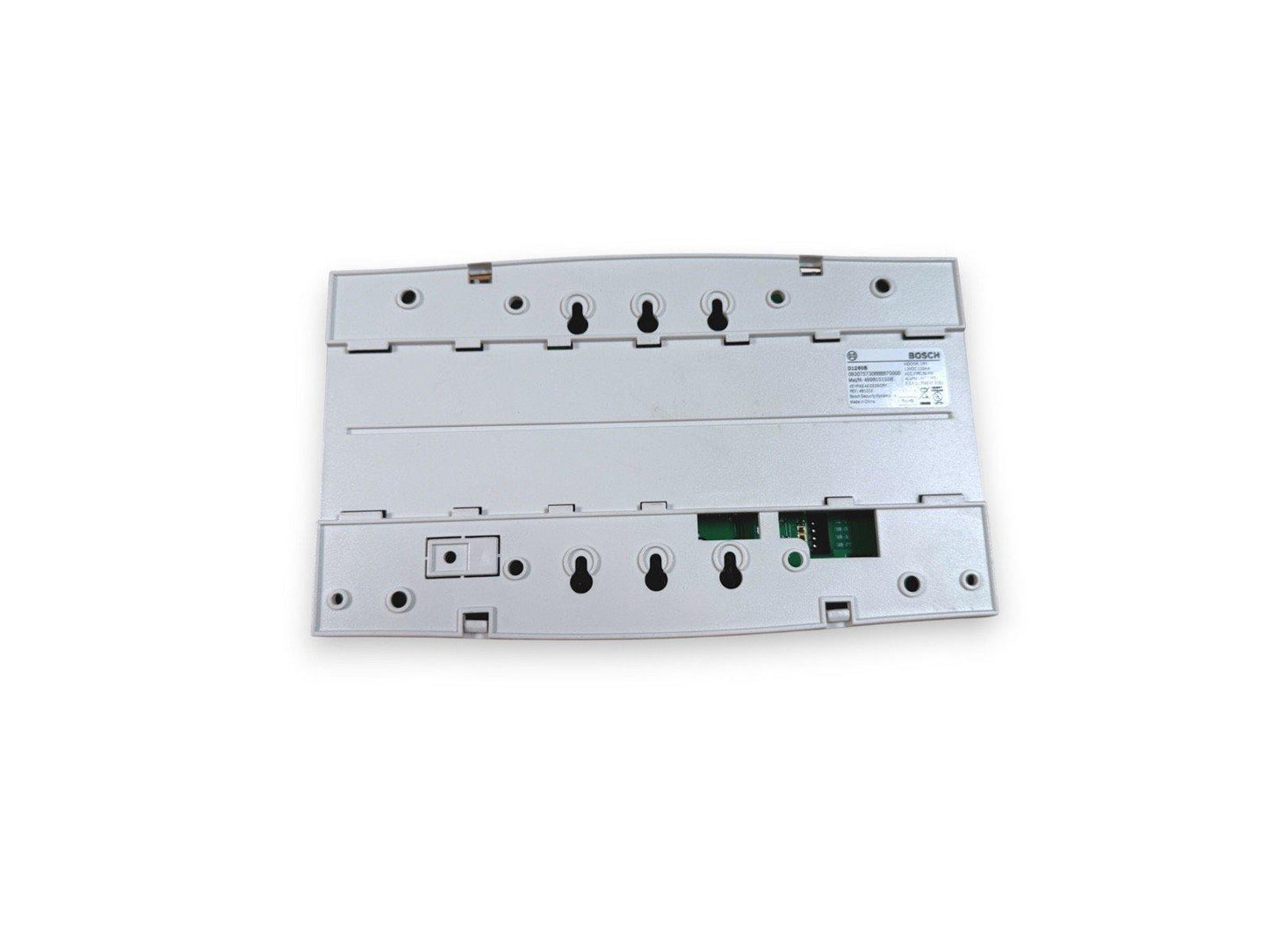 Bosch fire alarm control panel back view with mounting holes and circuit board