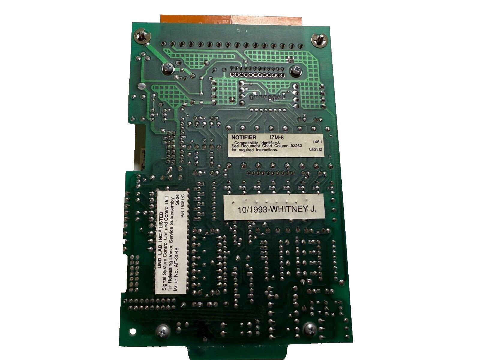 Fire alarm control panel circuit board with notifier labels and UL listed components