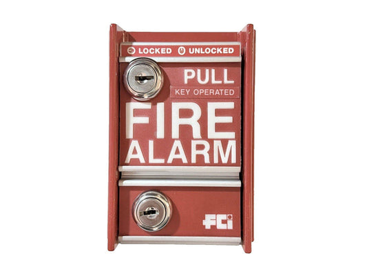 Red FCI pull station fire alarm with key operated lock and unlocked indicator