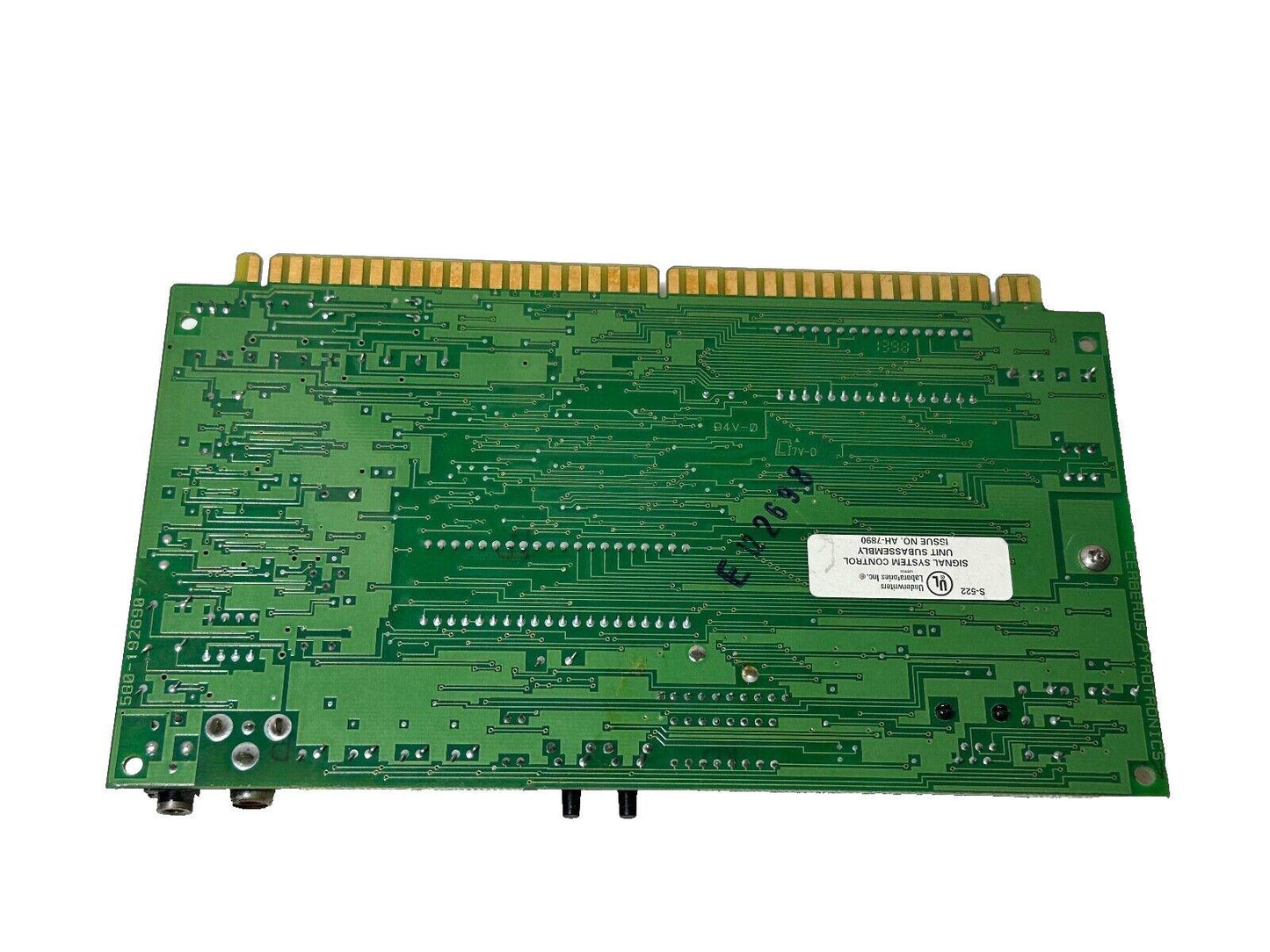 Green fire alarm control panel circuit board with UL label, used for signal system control in fire safety systems