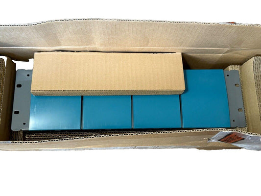 Blue fire alarm control panels in shipping box, new surplus equipment