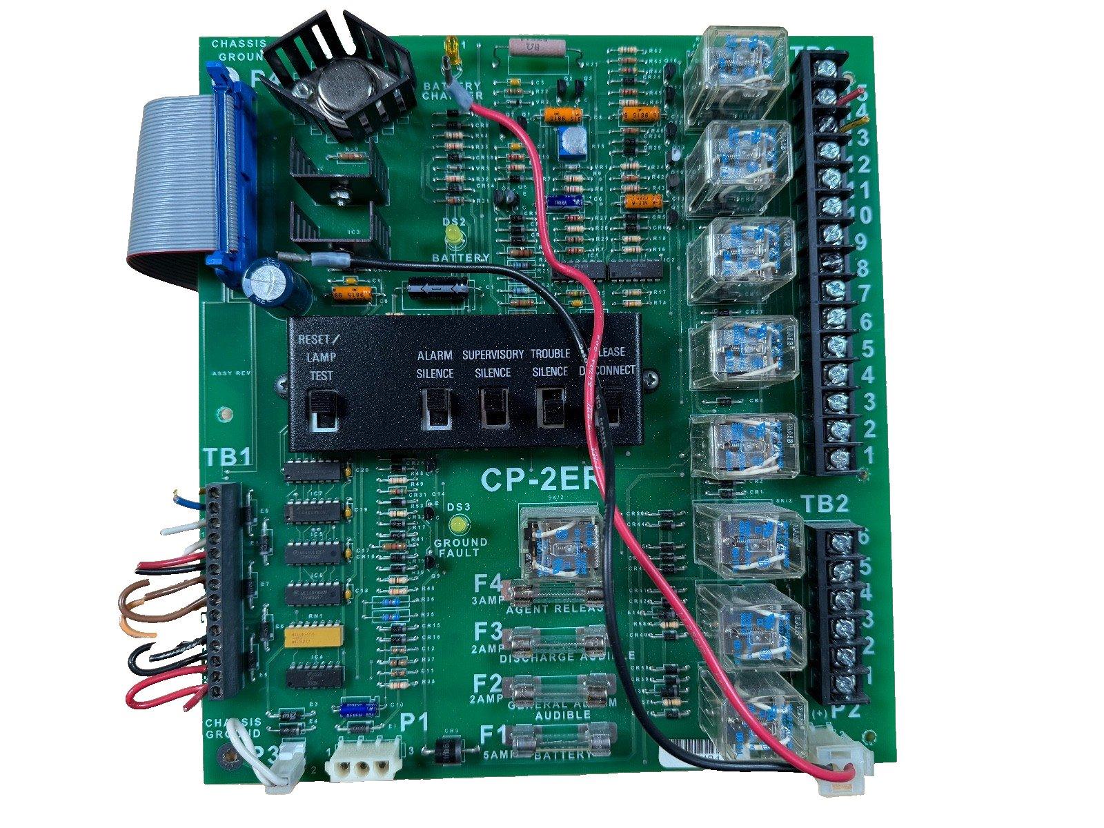 CP-2ER fire alarm control panel circuit board with relays, fuses, and terminal blocks for fire safety systems