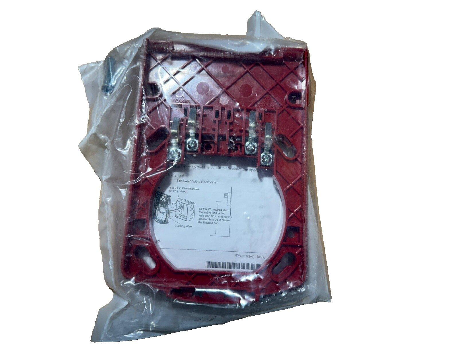 Red fire alarm speaker backplate in plastic wrap, for 4x4 electrical box, NFPA 72 compliant
