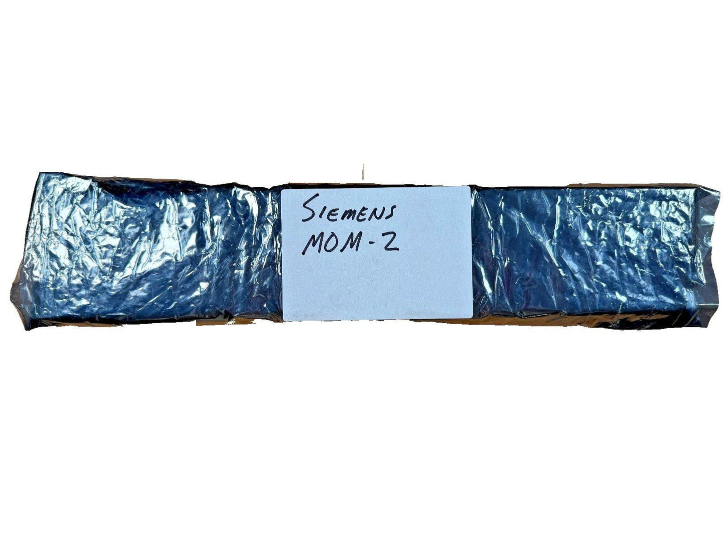 Siemens MOM-2 fire alarm module in protective blue wrap, labeled for identification