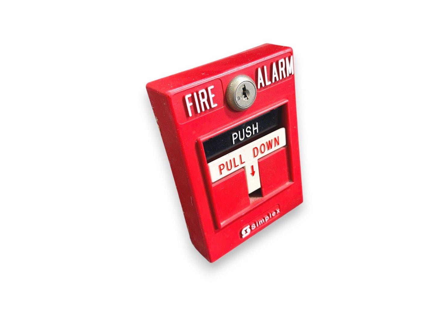 Red Simplex fire alarm pull station with push and pull down lever for emergency use