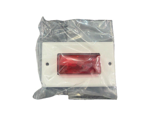 Red fire alarm indicator light in clear packaging, white base with mounting holes