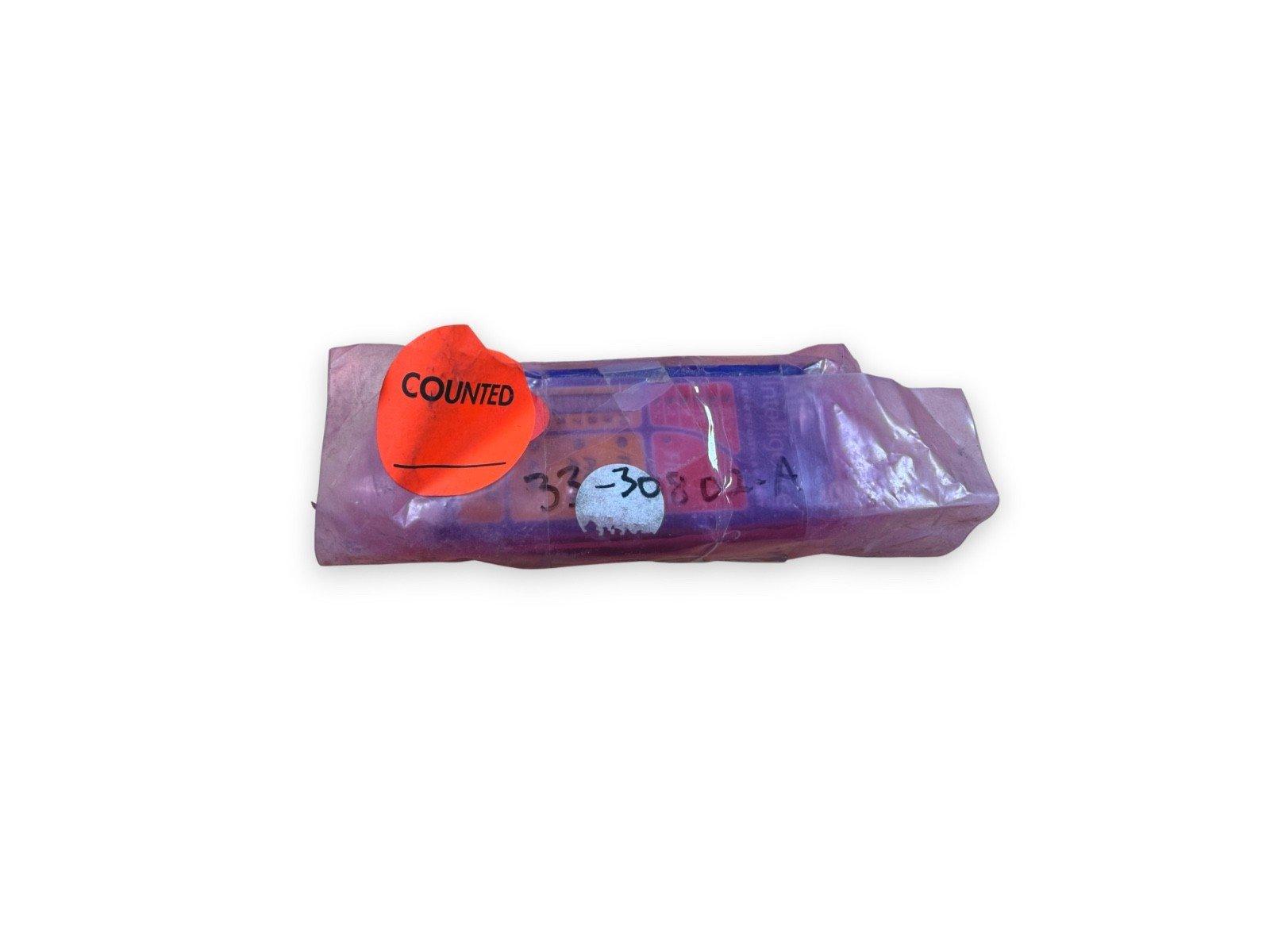 Used fire alarm control panel module in purple packaging with counted tag, model 33-30801-A