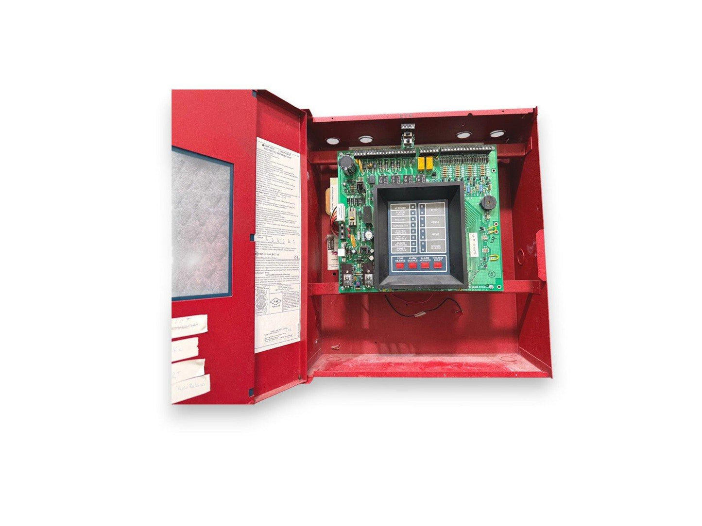 Red fire alarm control panel with exposed circuit board and digital display for commercial safety systems