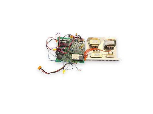 Fire alarm control panel circuit board with wiring and transformers for commercial systems