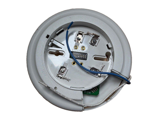 Fire alarm detector backplate with wiring terminals and DIP switches for installation
