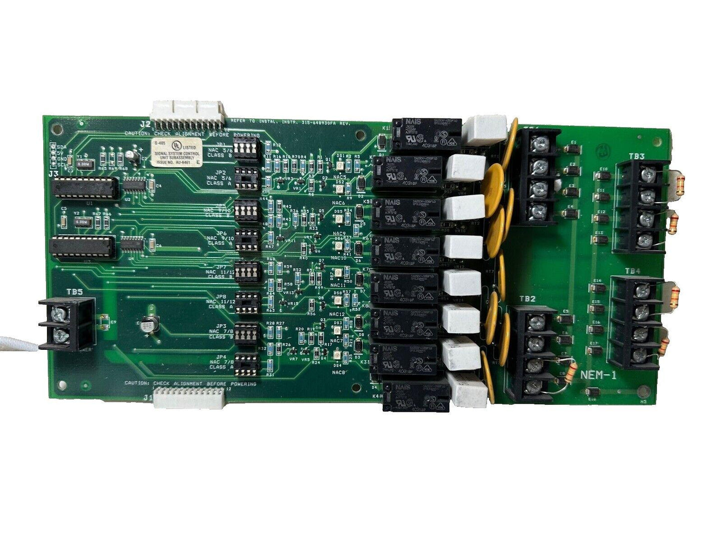 Fire alarm control panel circuit board with relays and terminal blocks for commercial systems