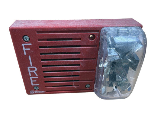 Red Simplex fire alarm with strobe light and speaker, used fire safety equipment
