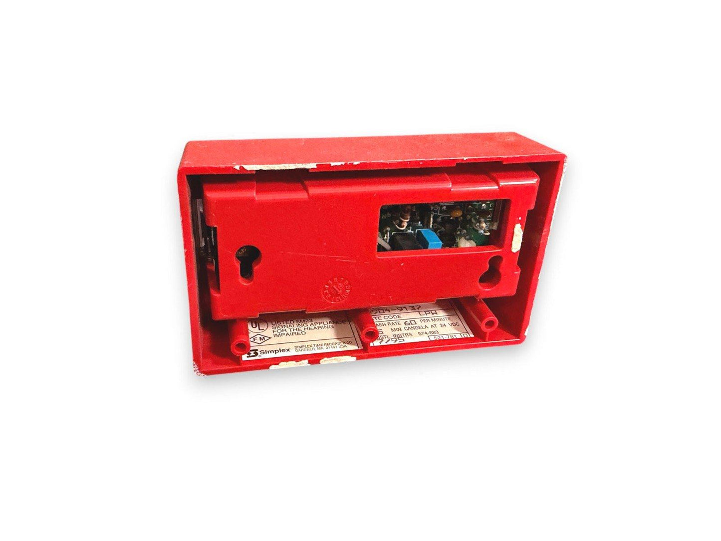 Red Simplex fire alarm strobe with exposed circuitry, UL listed for hearing impaired, used fire safety equipment