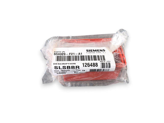 Siemens fire alarm component S54329-F21-A1 in sealed packaging, red plastic part for fire safety systems