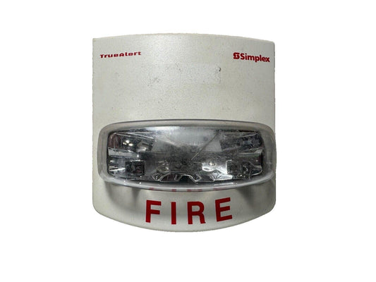 Simplex TrueAlert fire alarm strobe light with red FIRE label, used fire safety equipment