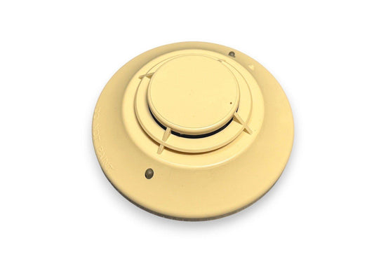 Beige fire alarm detector with 'DO NOT PAINT' text, ceiling-mounted safety device