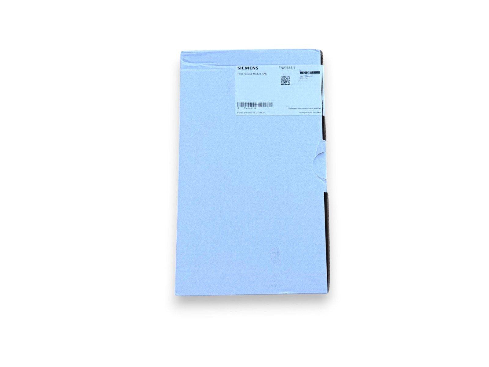 Siemens FN2013-U1 Fiber Network Module in blue packaging, fire alarm system component