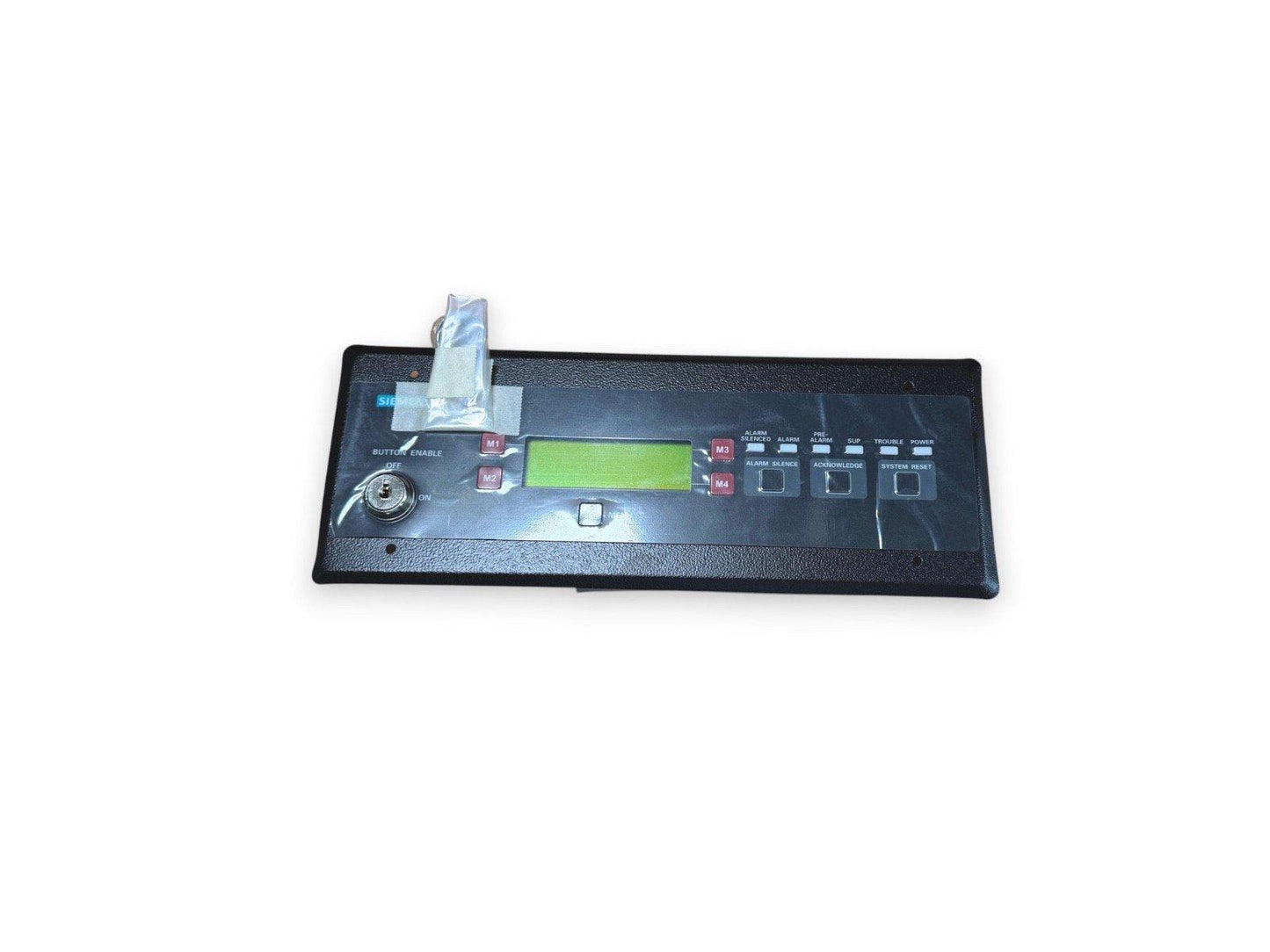 Siemens fire alarm control panel with LCD display and system status buttons for alarm, silence, and reset functions