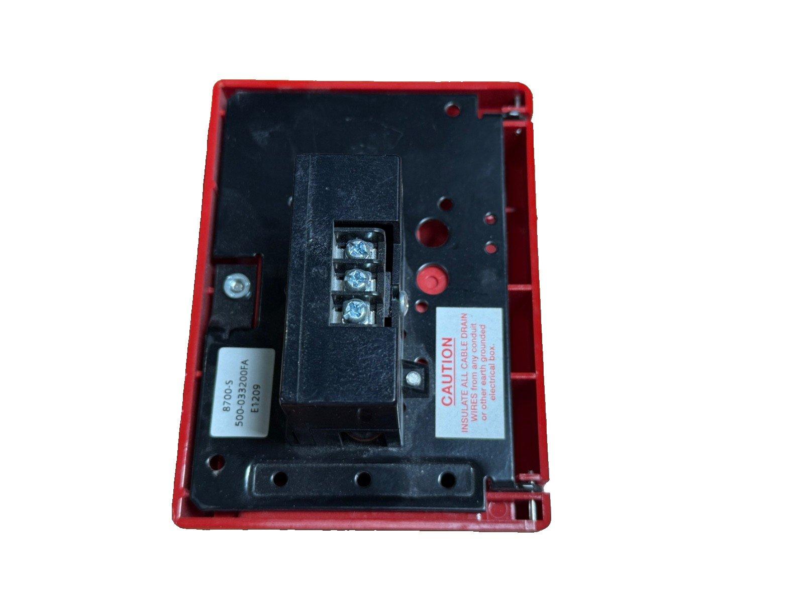 Red fire alarm control module with terminal connections and caution label, model 8700-S
