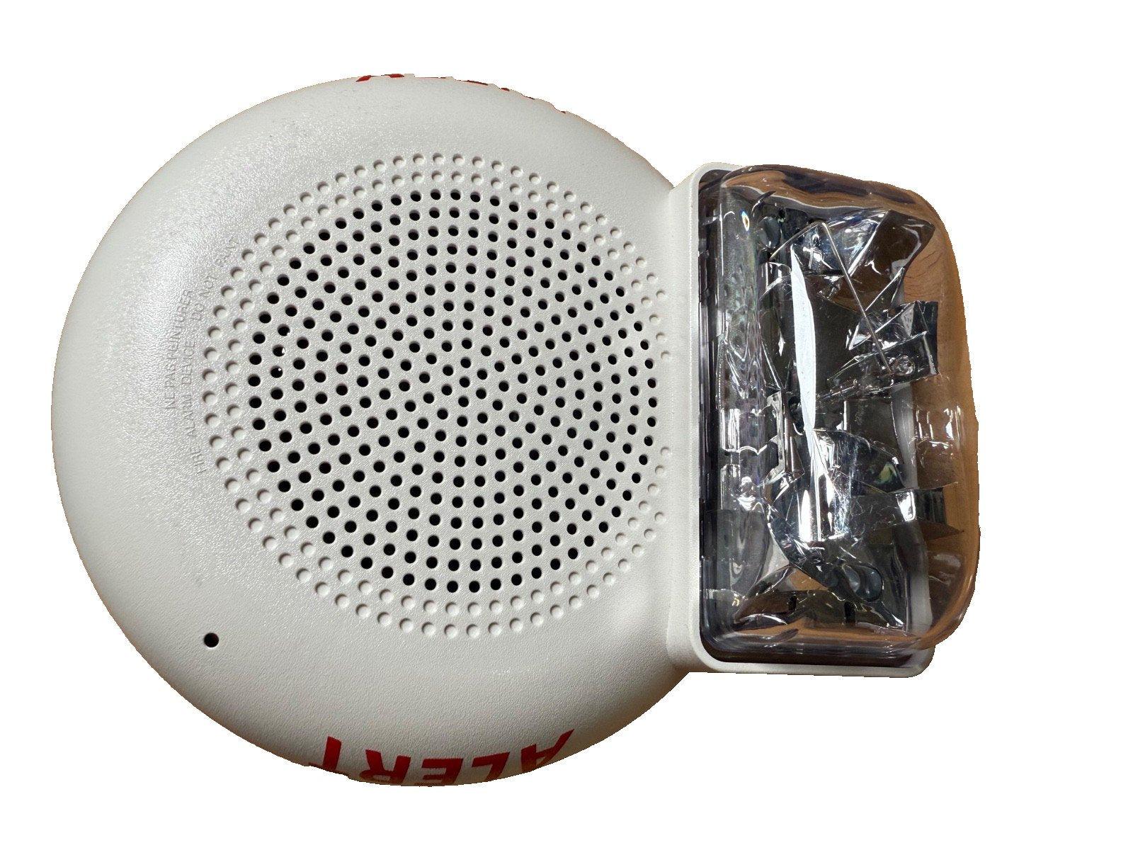 White fire alarm horn strobe with clear lens and perforated speaker grille for emergency alerts