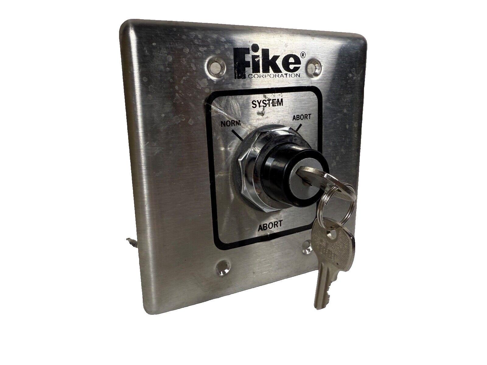 Fike fire alarm system key switch with abort and normal positions, metal housing, key inserted