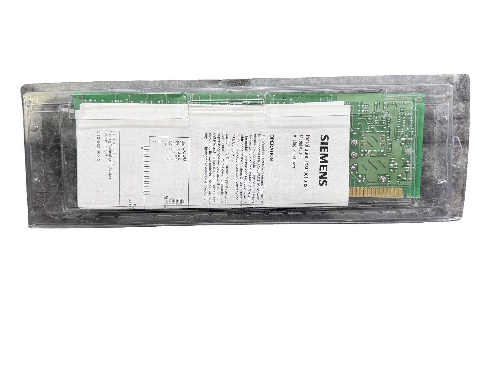 Siemens ALD-21 Analog Loop Driver fire alarm module in clear packaging with installation instructions