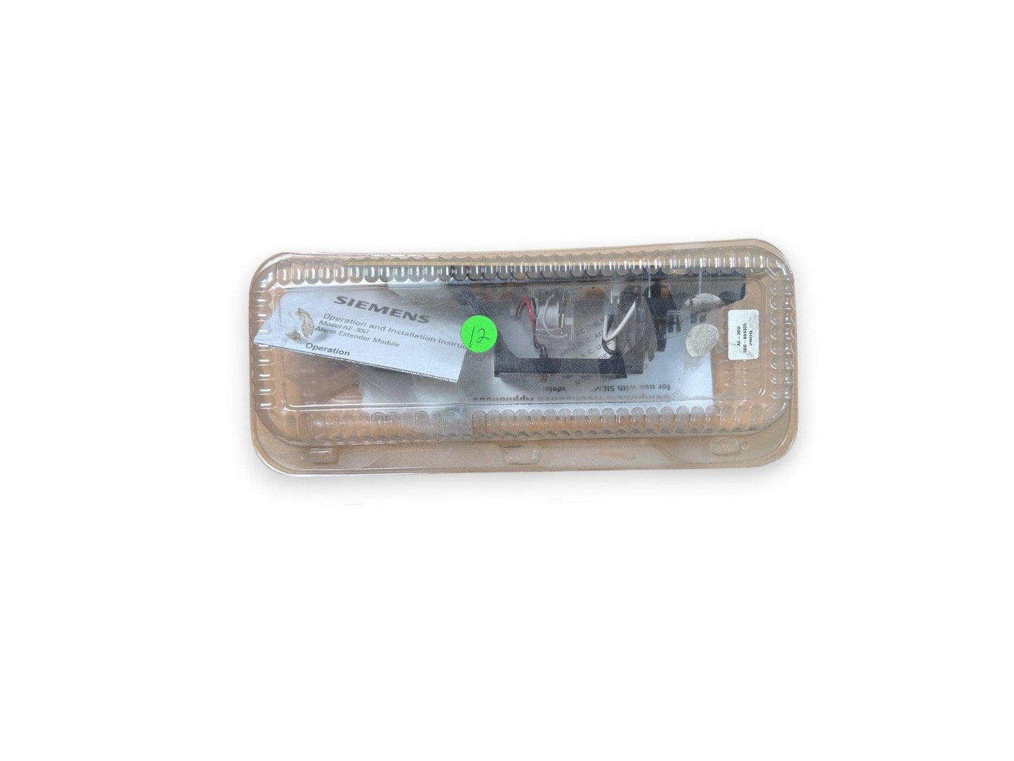 Siemens AE-30U Alarm Extender Module in clear packaging with installation guide, fire alarm equipment