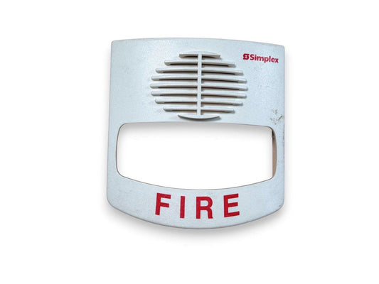 Simplex fire alarm horn with red FIRE label and speaker grille, white housing for safety systems