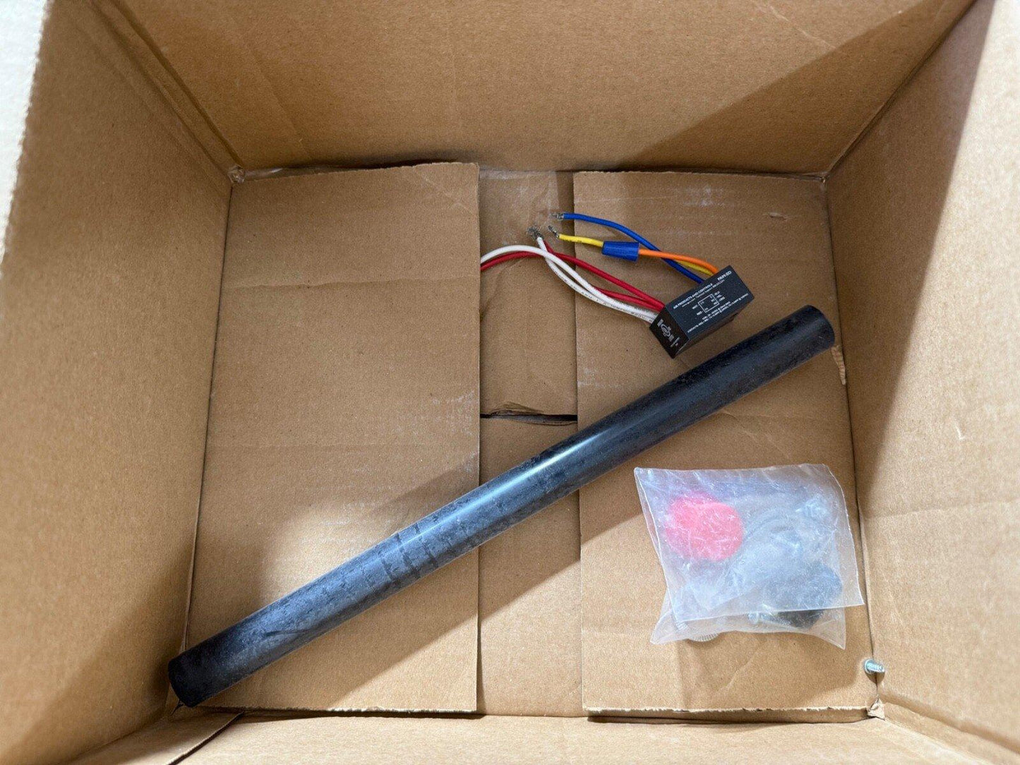 Fire alarm strobe light kit with wiring and mounting hardware in box