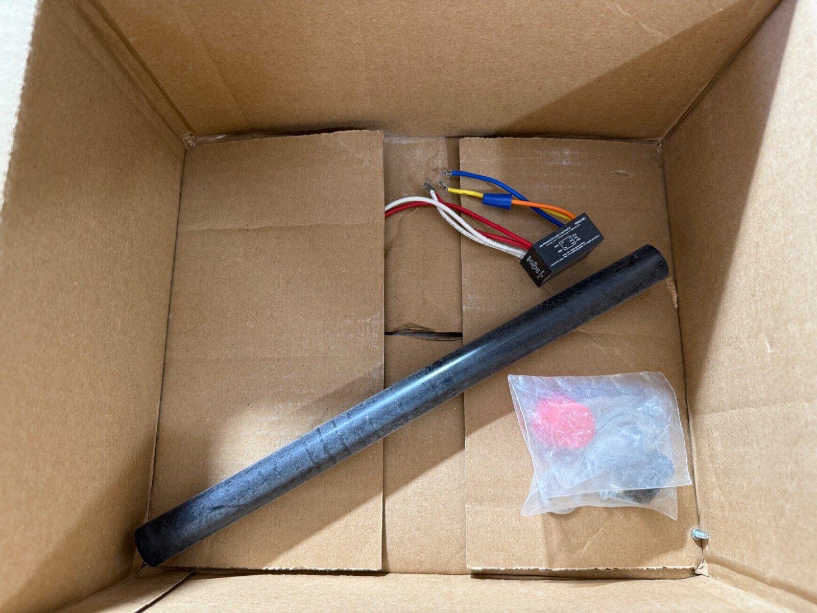 Fire alarm strobe light kit with wiring and mounting hardware in box