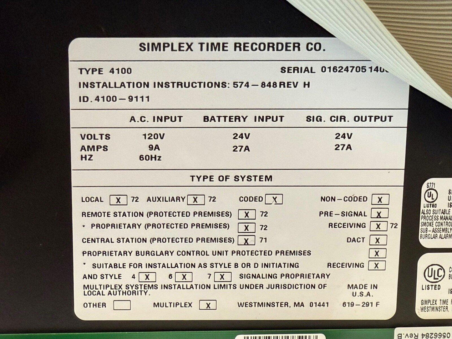 Simplex Type 4100 fire alarm control panel spec label with voltage, amps, UL listed, made in USA