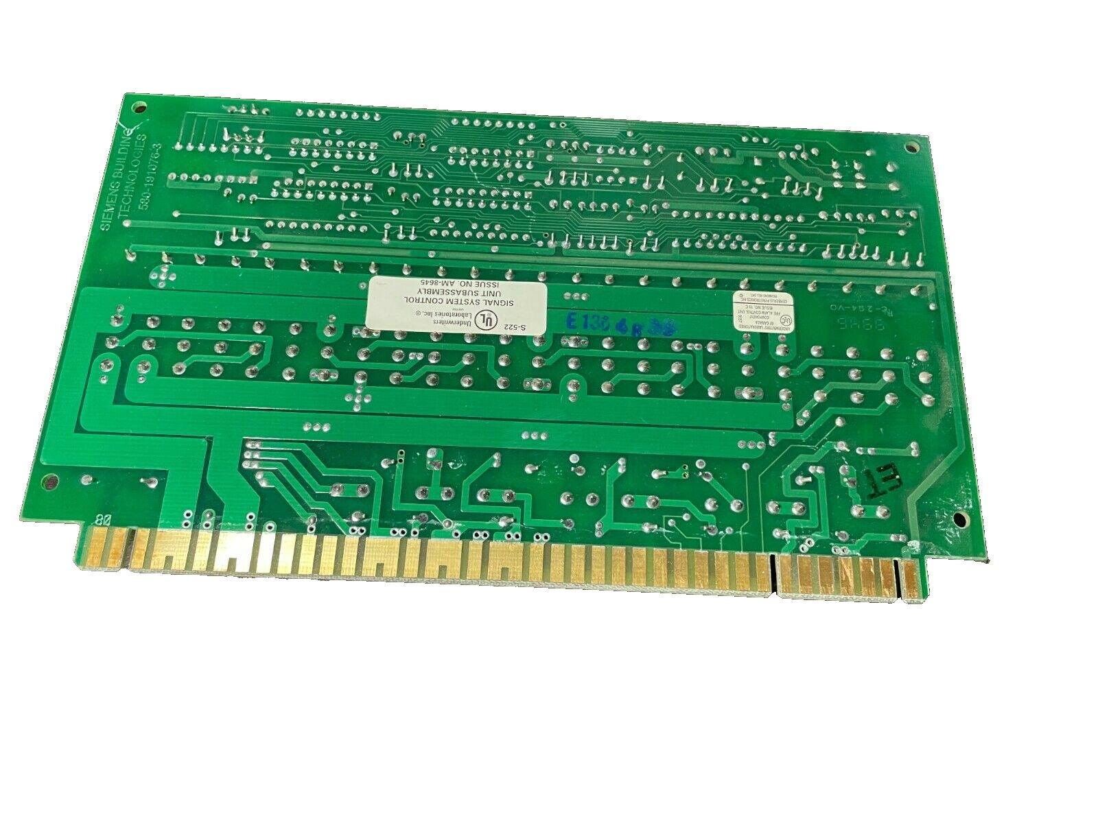 Siemens fire alarm control panel circuit board, green PCB with gold edge connectors and UL label