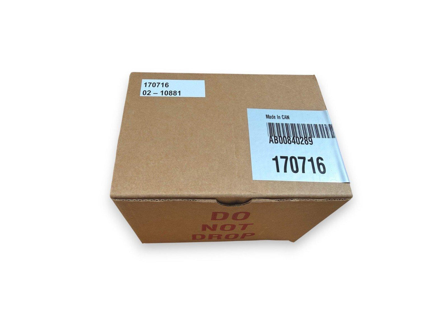 Fire alarm equipment box labeled 170716, Made in CAN, with DO NOT DROP warning