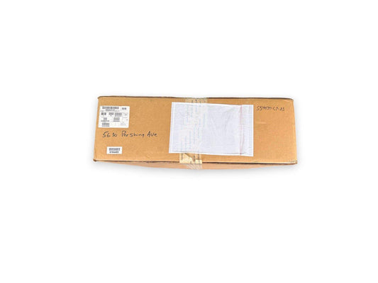 Sealed cardboard box with shipping labels and handwritten address, ready for fire alarm equipment delivery