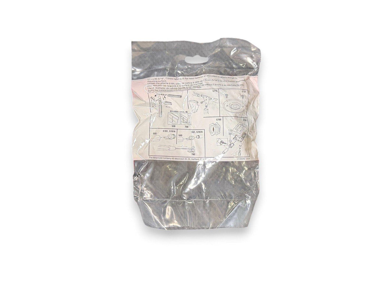 Fire alarm mounting hardware kit in sealed plastic packaging with installation diagrams