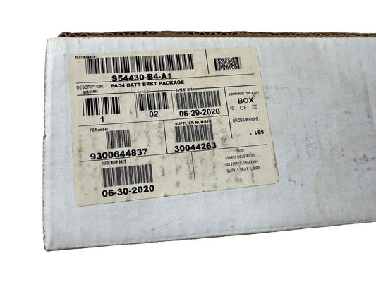Siemens S54430-B4-A1 PAD4 battery bracket package box with shipping label and barcodes