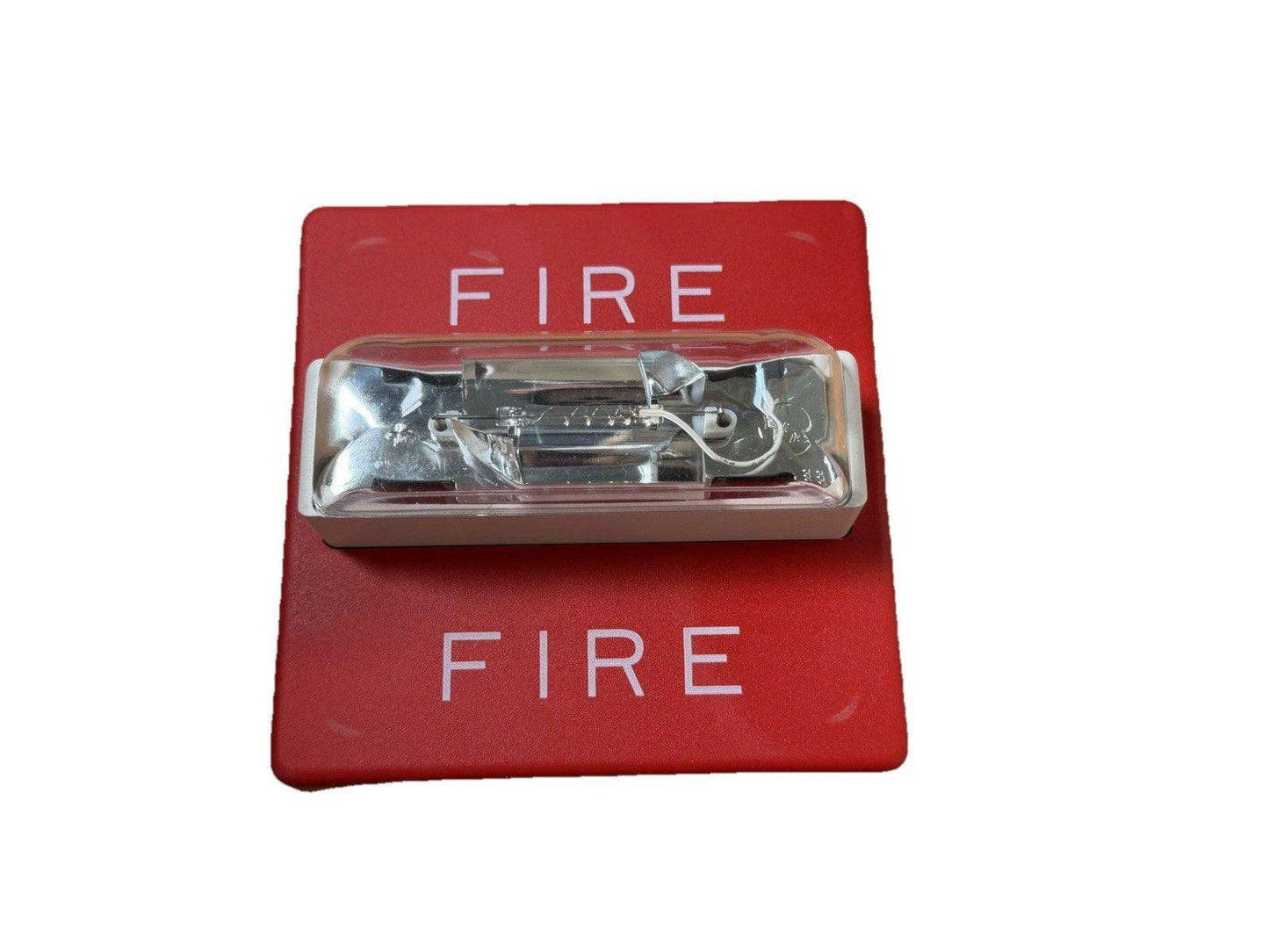 Red fire alarm pull station with clear cover and 'FIRE' label for emergency use