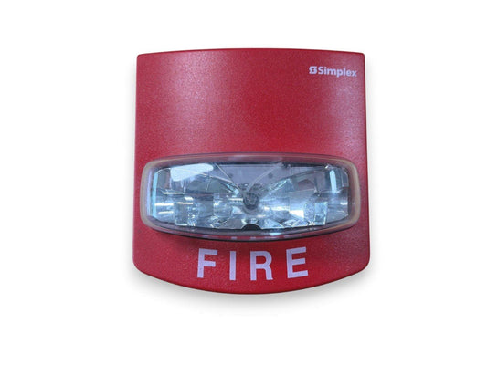 Red Simplex fire alarm strobe light with clear lens and bold FIRE label for emergency warning systems