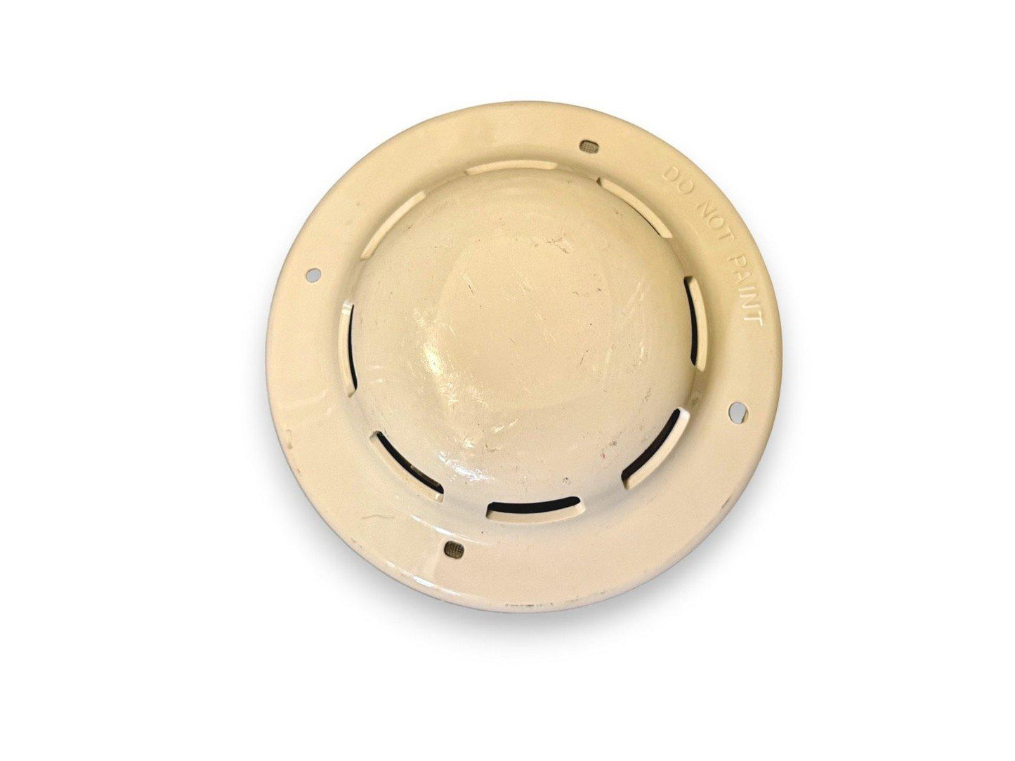 Beige fire alarm detector base with 'DO NOT PAINT' text, used fire alarm equipment
