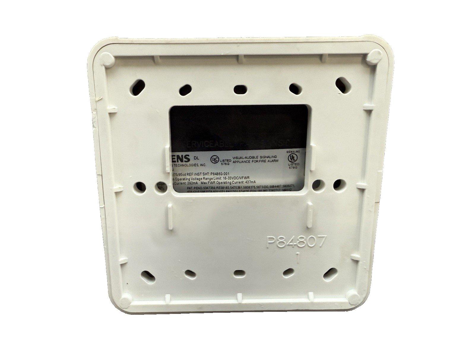 Back of a white fire alarm device with UL listing and model P84807, for fire safety systems.