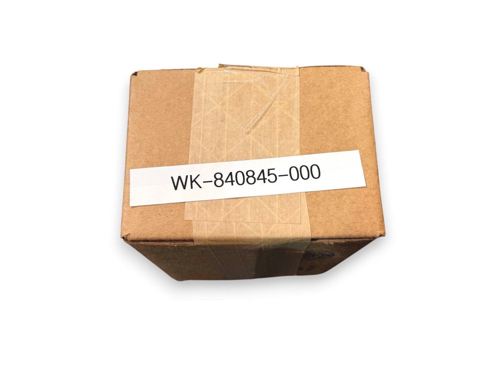 Sealed cardboard box with label WK-840845-000, fire alarm equipment part, ready to ship