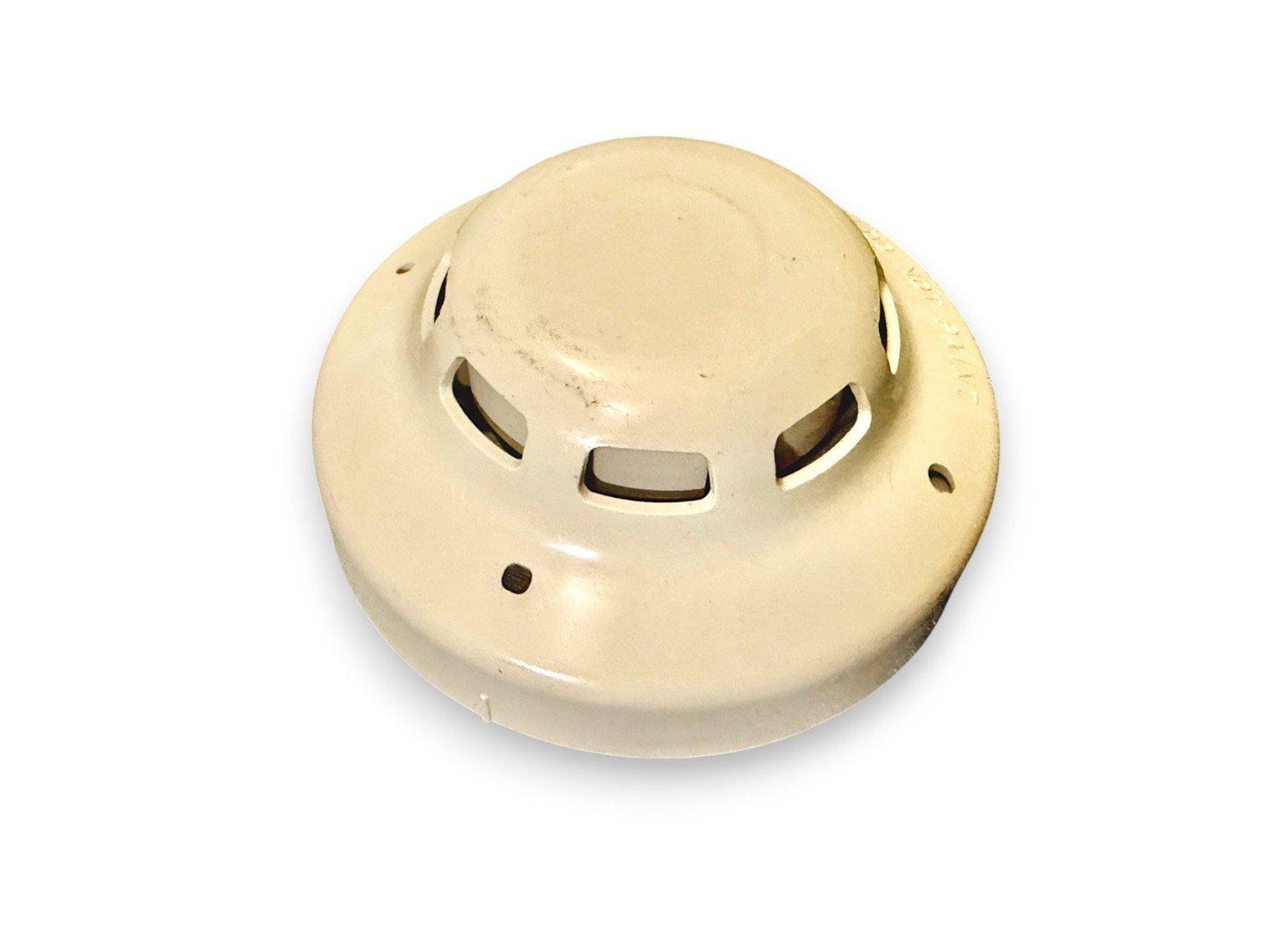 Beige smoke detector with vented design for fire alarm systems