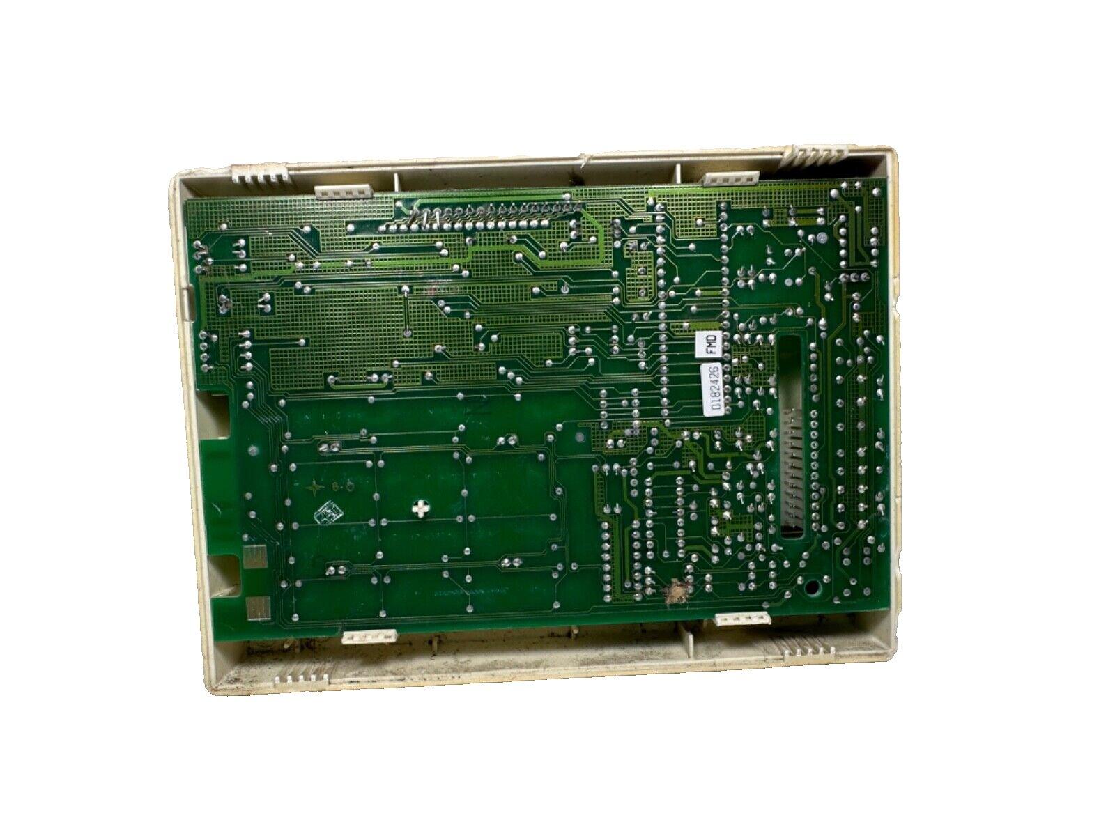 Used fire alarm control panel circuit board with green PCB and connectors