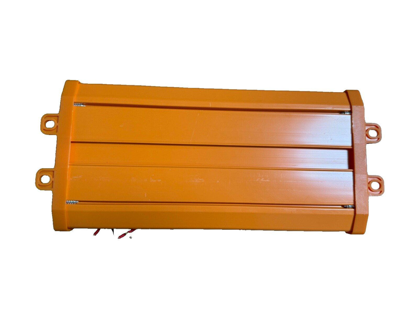 Orange fire alarm control panel with mounting brackets and wiring terminals
